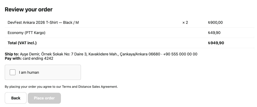Review page with an unticked 'I am human' checkbox and a disabled Place order button
